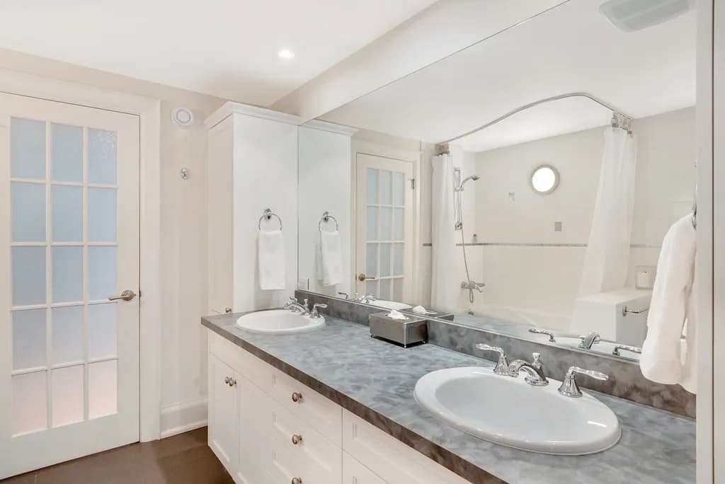 Renovated bathroom with a double vanity
